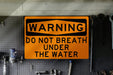Funny "Do Not Breathe Underwater" Metal Sign for Pool and Beach House Decor