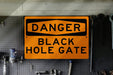 Enter at Your Own Risk - Warning Black Hole Gate Metal Sign: A Gift for Sci-Fi Lovers