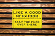 Like A Good Neighbor Stay The Fuck Over There Metal Sign