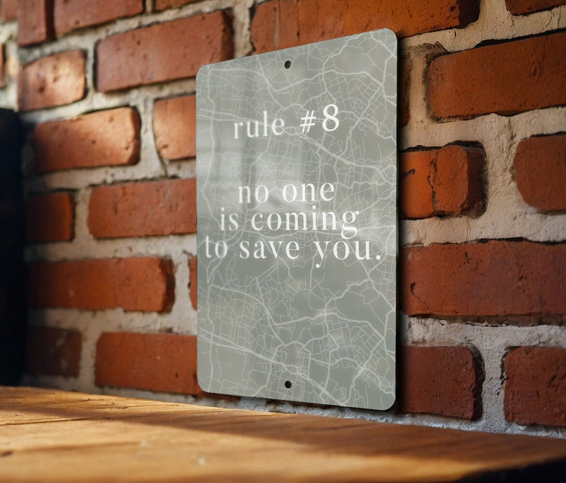 a sign on a brick wall that says rules 8 no one is coming to save