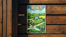 a sign on a wooden fence that says iowa
