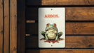 Arson Frog Metal Poster - Frog Humor, Unique Art, Quirky Decor, Nature Inspired, Wall Art