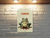 Arson Frog Metal Poster - Frog Humor, Unique Art, Quirky Decor, Nature Inspired, Wall Art