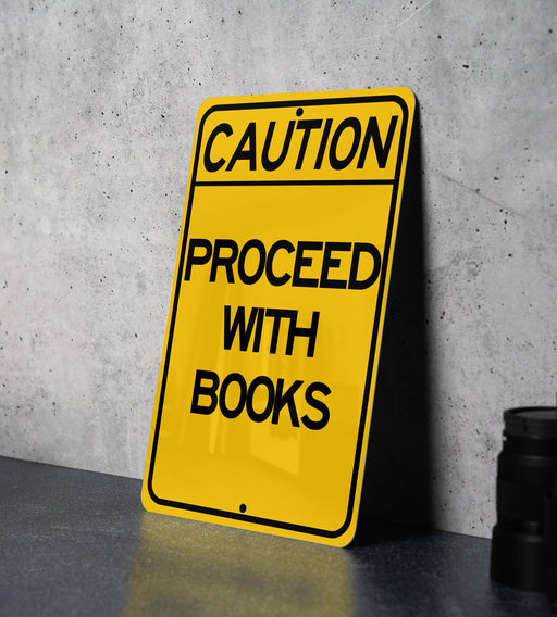 a yellow caution sign sitting on top of a table