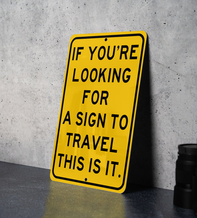 a yellow sign that says if you're looking for a sign to travel this
