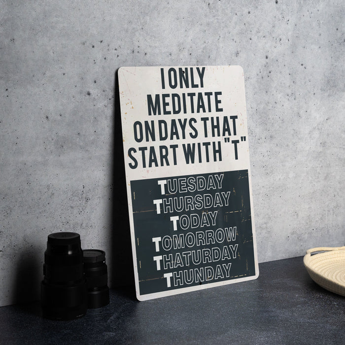 a sign sitting on top of a table next to a cup