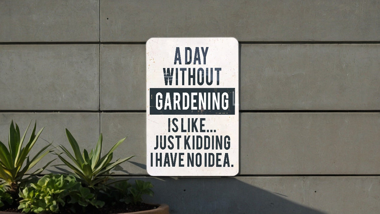 a sign on the side of a building that says a day without gardening is like
