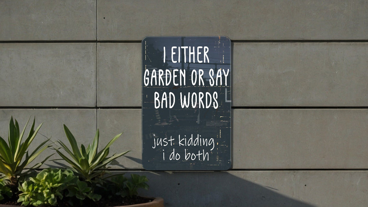 a sign on the side of a building that says i either garden or say bad