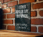 a sign on a brick wall that says i either read or say bad words just