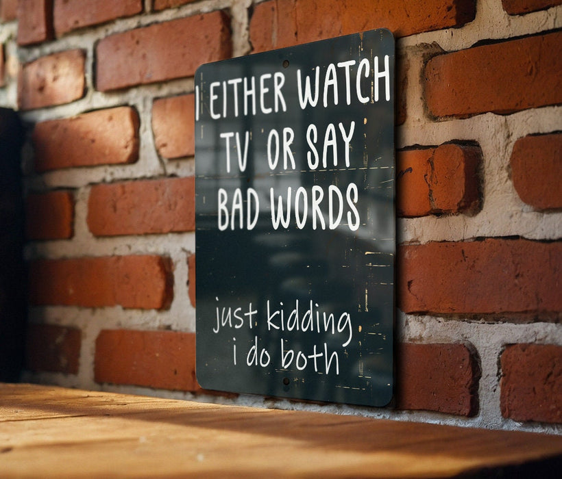 a sign that says i either watch tv or say bad words