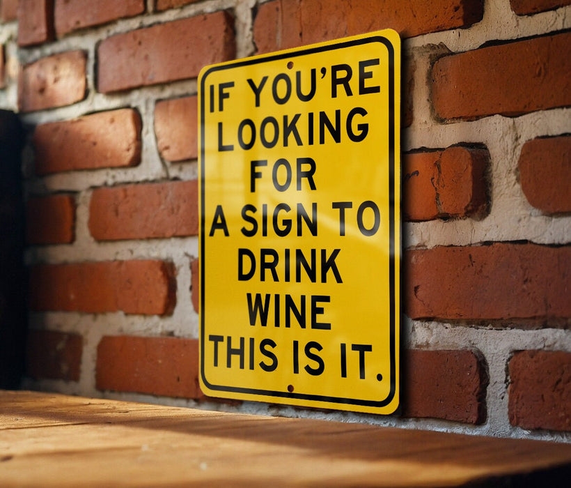 a yellow sign on a brick wall saying if you're looking for a sign