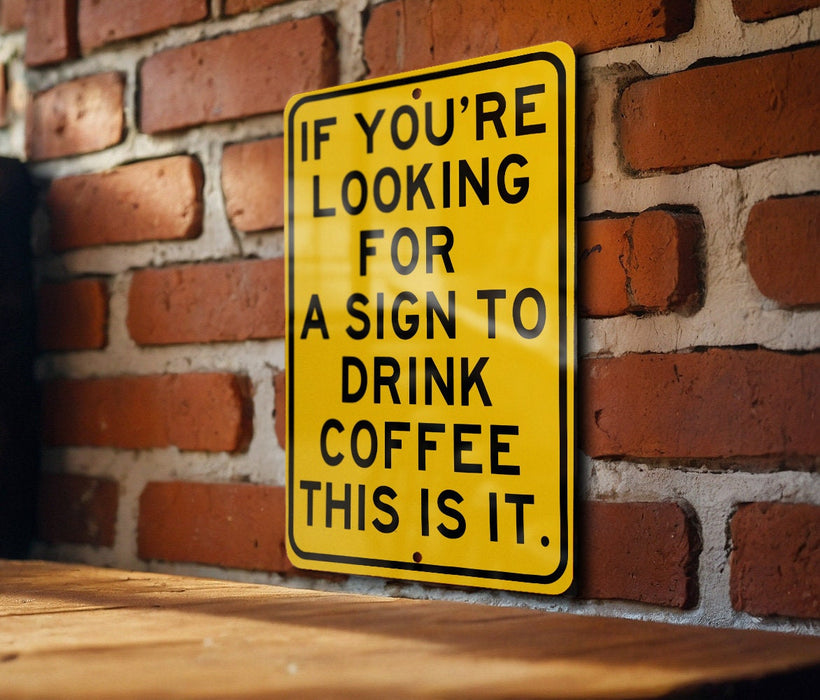 a yellow sign on a brick wall saying if you're looking for a sign