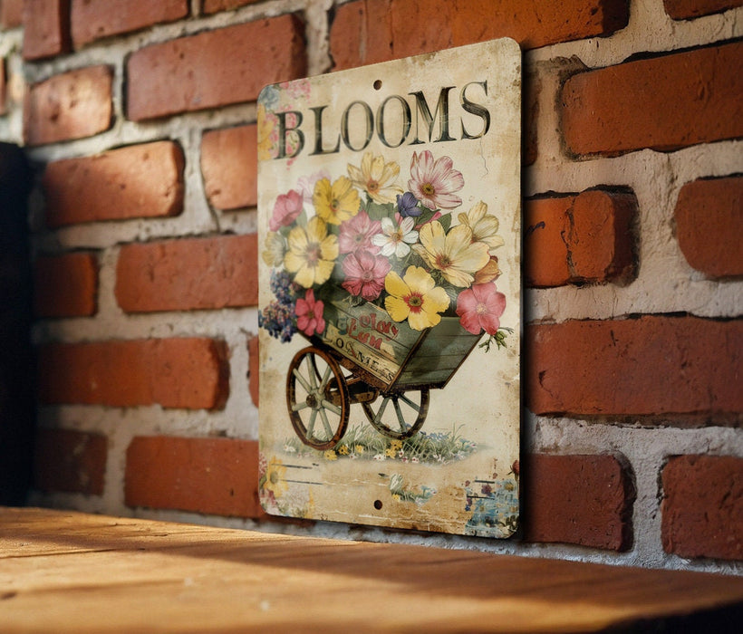 a picture of a flower cart on a brick wall