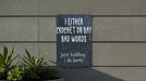 a sign on a wall that says i either crochet or say bad words