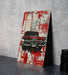 a painting of a red car on a wooden sign