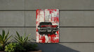 a painting of a car on a wall
