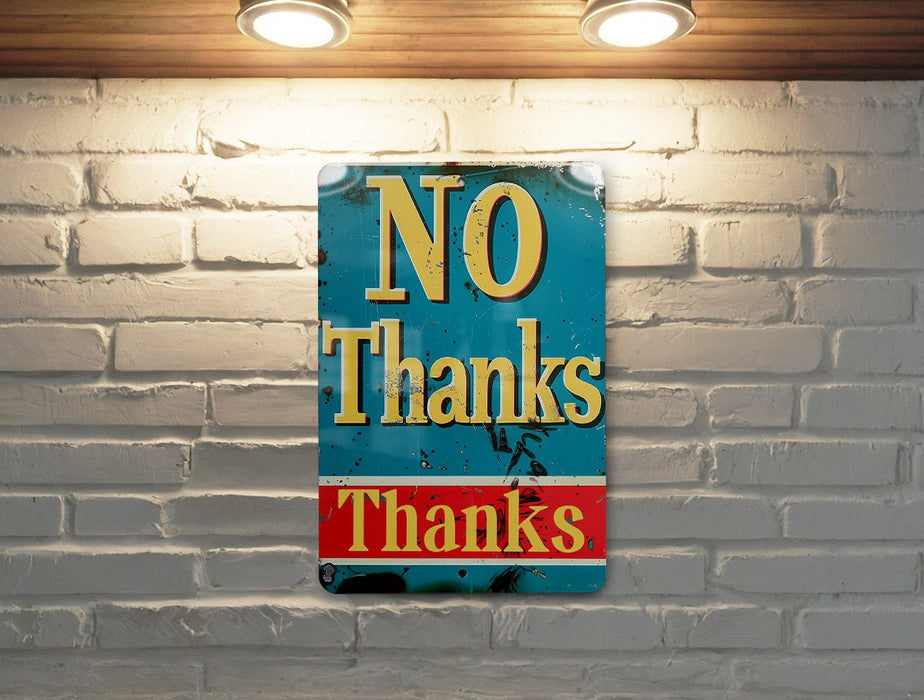 a no thanks sign on a brick wall