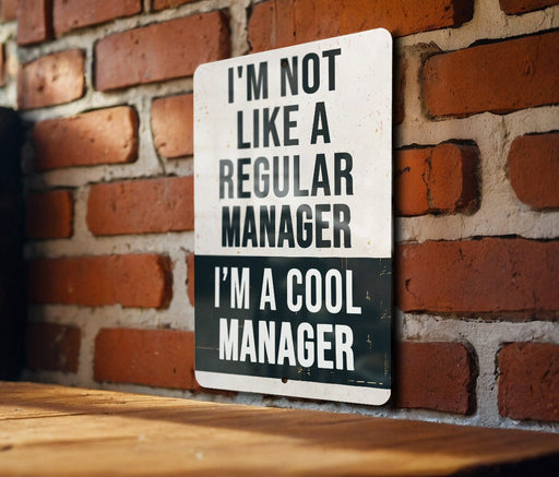 a sign on a brick wall that says i'm not like a regular manager