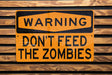 a yellow and black sign that says the sowbie's don't