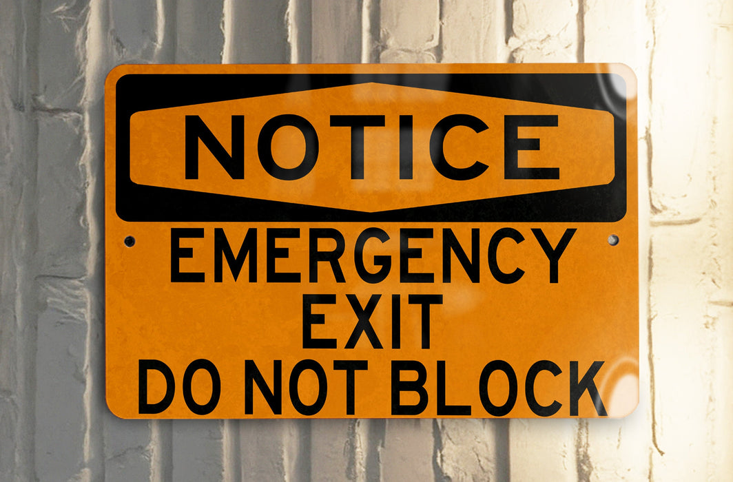 a do not block exit emergency notice sign