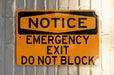 a do not block exit emergency notice sign