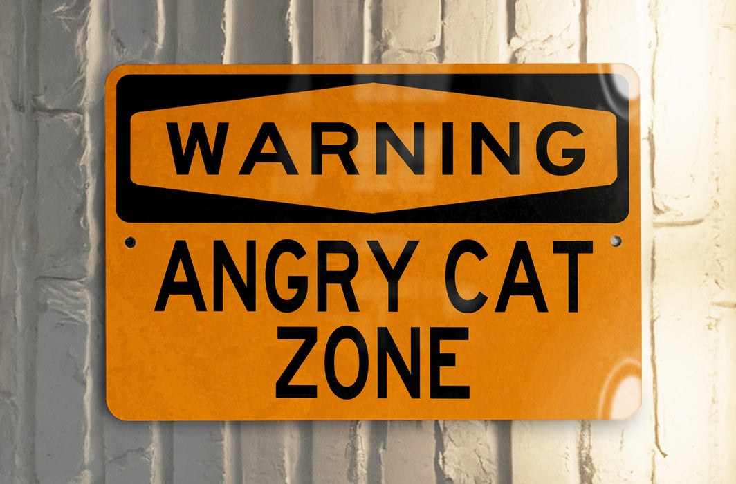 a yellow sign on a white wall that says zone