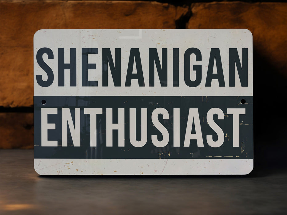 a white and black sign sitting on top of a table