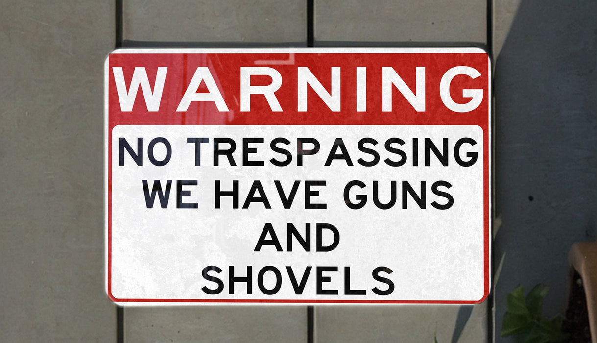 a red and white sign on a wall