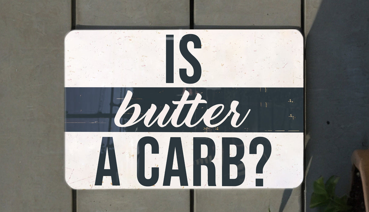 a white sign with black lettering on it