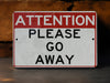a red and white sign that says attention please go away