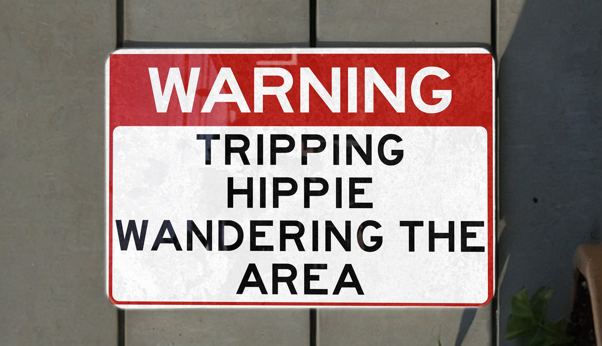 a red and white sign on a wall