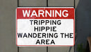 a red and white sign on a wall