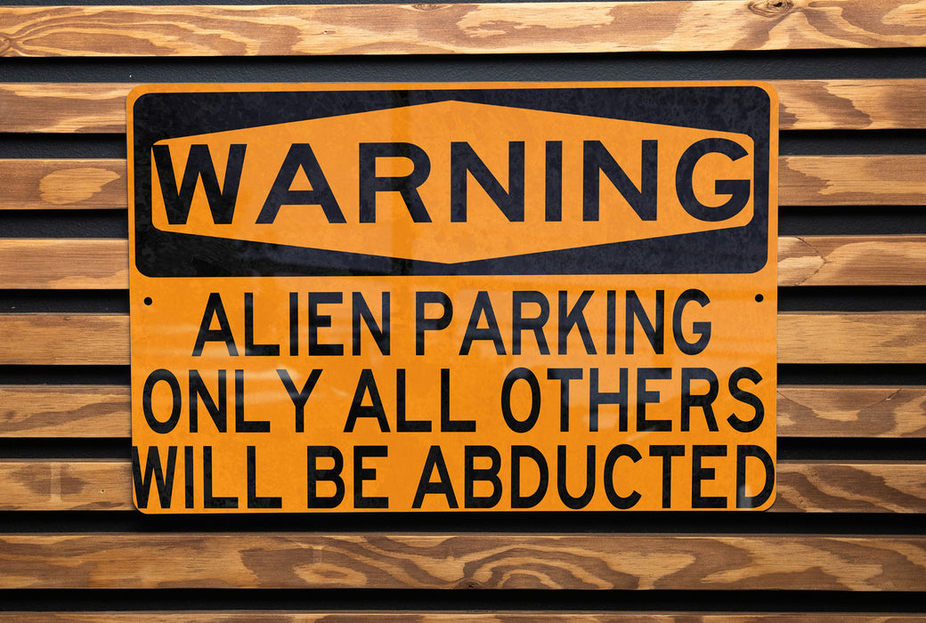 a yellow and black sign on a wooden wall