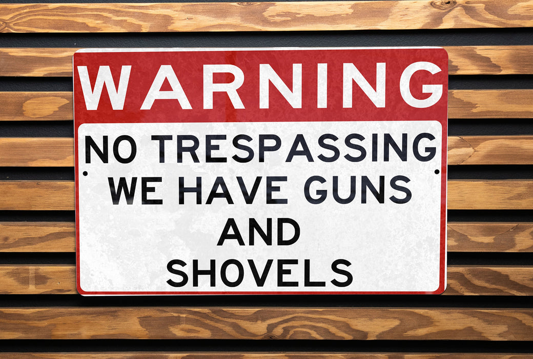 a red and white sign on a wooden bench