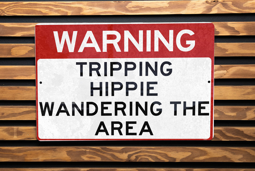 a red and white sign on a wooden bench