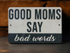 a sign that says good moms say bad words