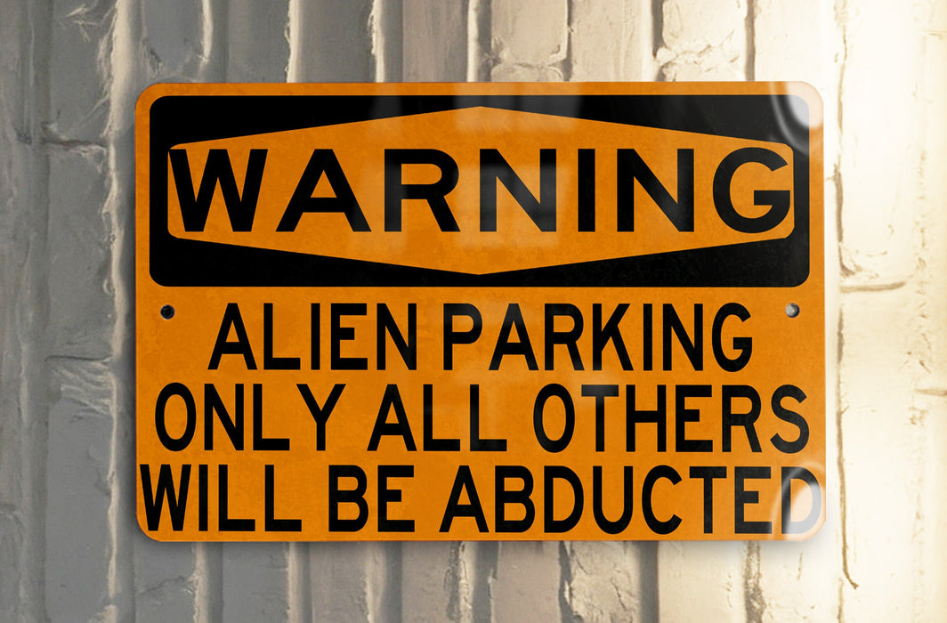 a yellow and black sign on a white wall