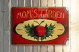 a red sign with a picture of a strawberry on it