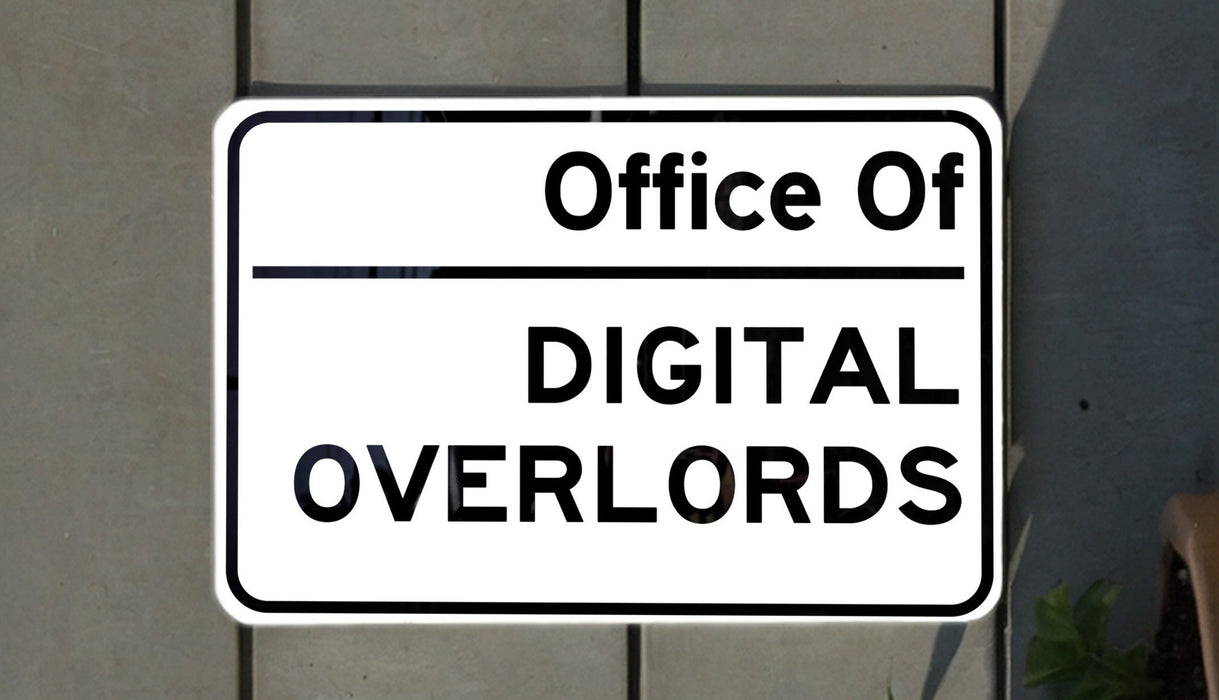 a white sign with black lettering on it