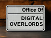 a white sign that says office of digital overlooks