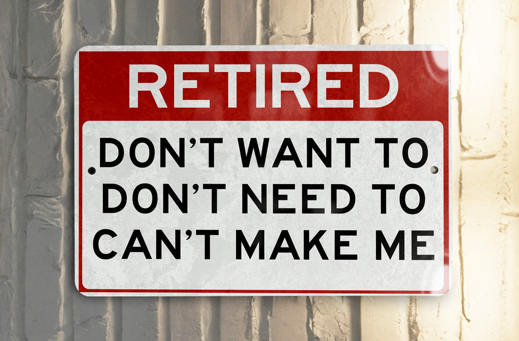 a red and white sign on a white wall