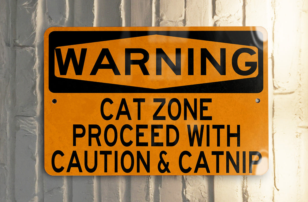 a yellow and black street sign on a pole