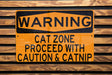 a yellow and black sign on a wooden wall
