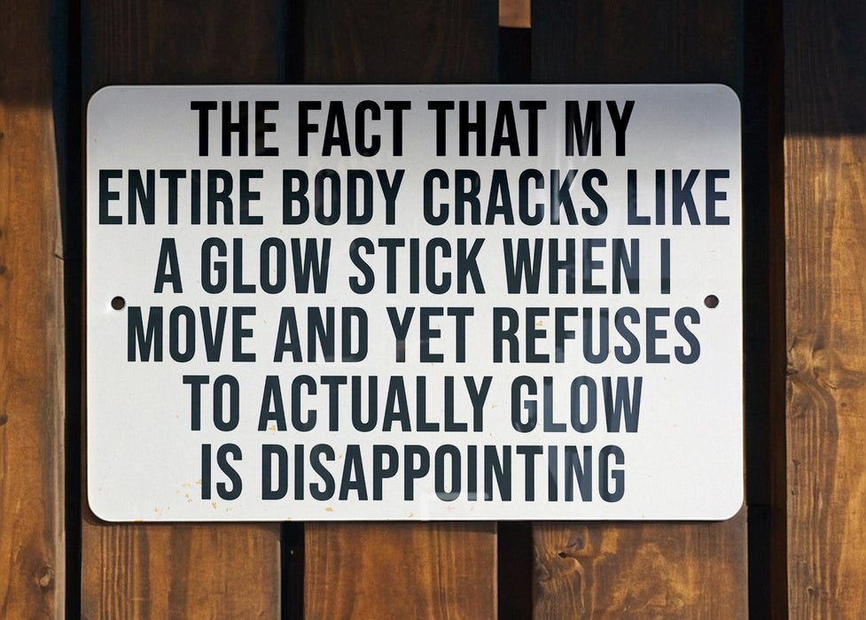 a white sign on a wooden fence that says it is dispensing 10