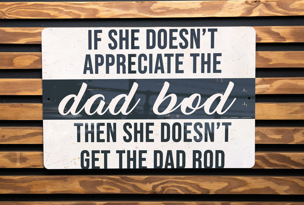 a sign on the side of a wooden bench