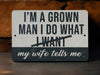 a sign that says i'm a grown man i do what i want my