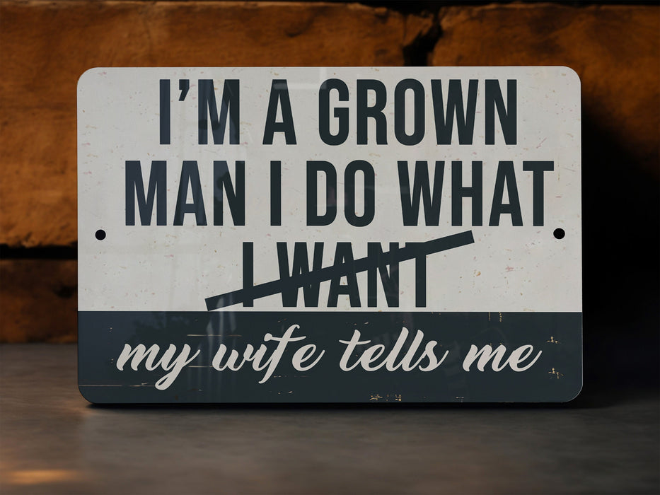 a sign that says i'm a grown man i do what i want my