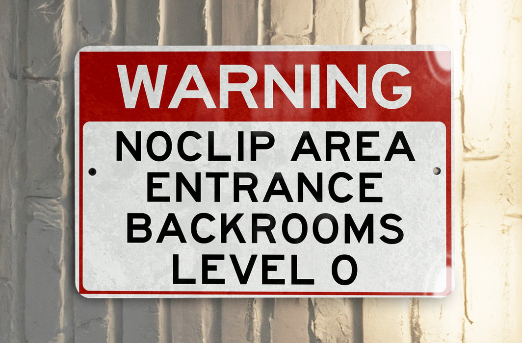 a red and white sign on a metal pole