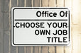 a white and black street sign on a pole