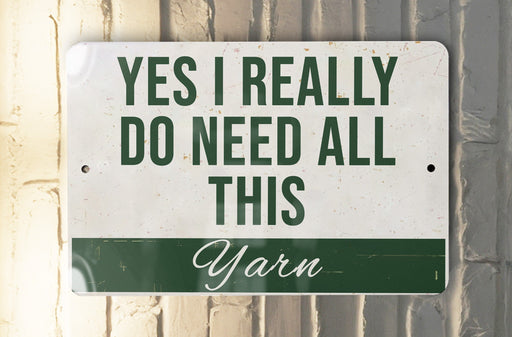 a sign that says yes i really do need all this yarn